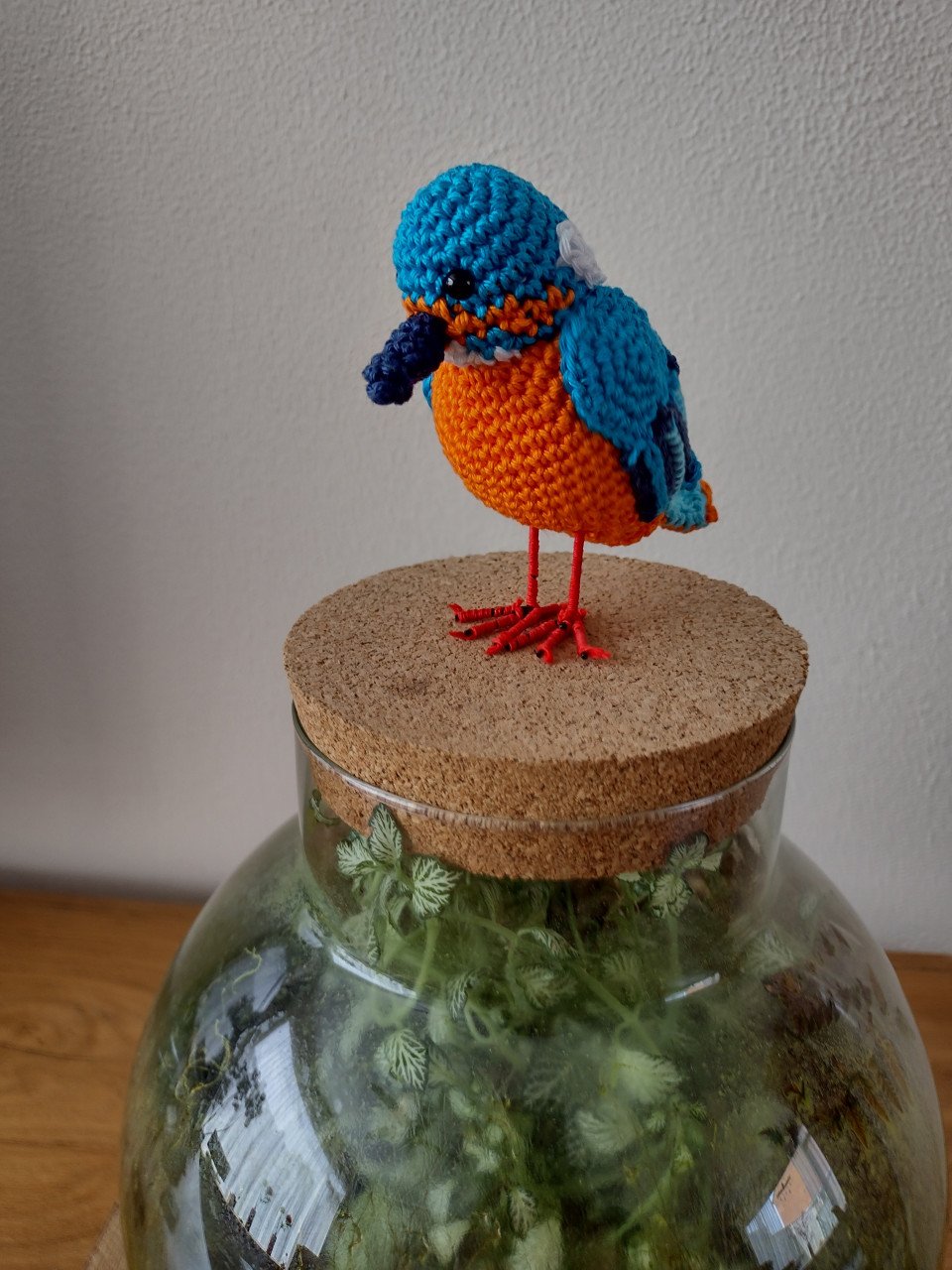 Gehaakte ijsvogel en of roodborstje