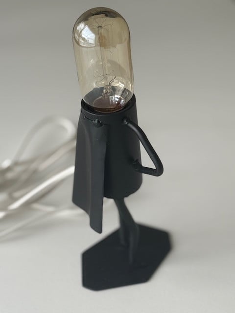 Smeedijzeren lampje (man met cape)