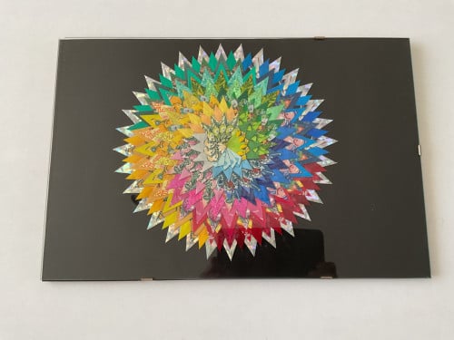 Mooi kunstwerkje  in lijstje achter glas.   Afmeting: 45x30 cm.