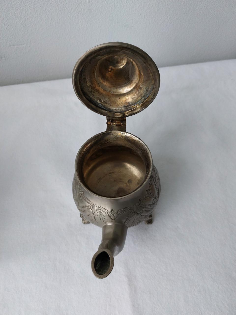 Marokkaanse Verzilverde theepotten.