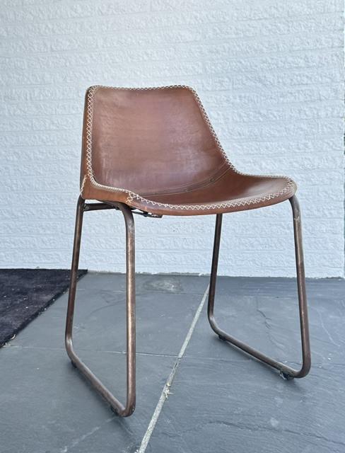 8 stuks lederen eetkamerstoelen