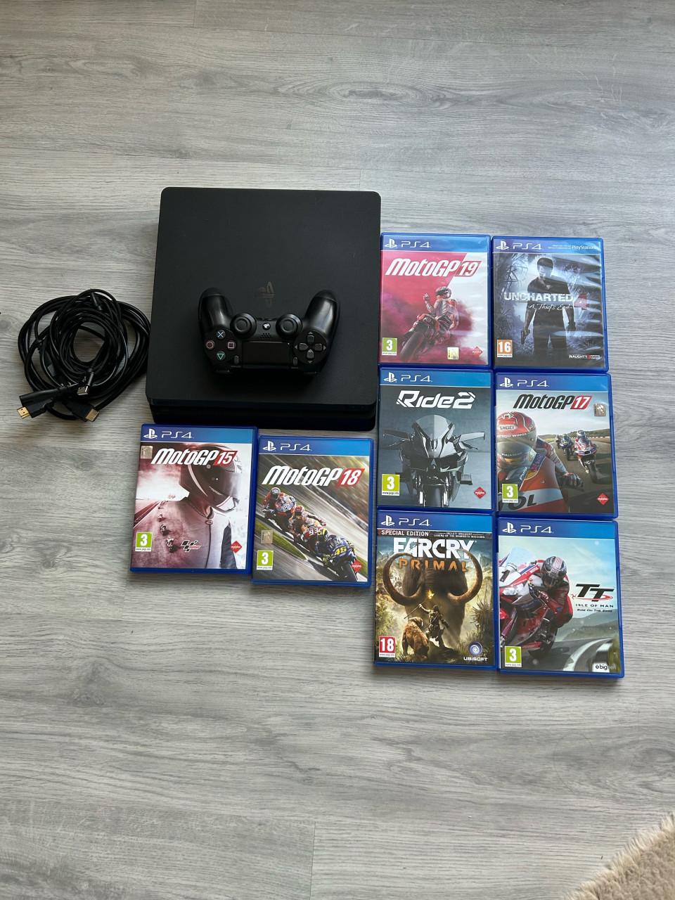 Playstation 4 slim + 8 games en alle toebehoren