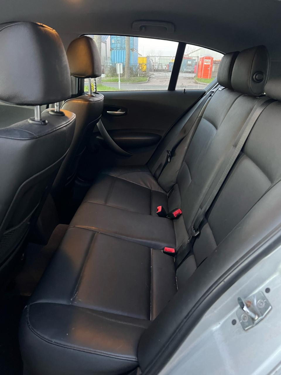 BMW 1-serie 118i High Executive 164.443km