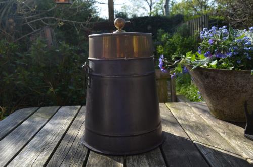 Antieke doofpot half koper half ijzer.