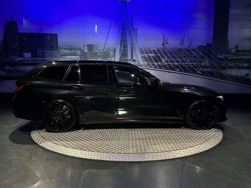 BMW 3-serie touring 330e xdrive *pano*360camera*sportstoelen*laser*eibach*