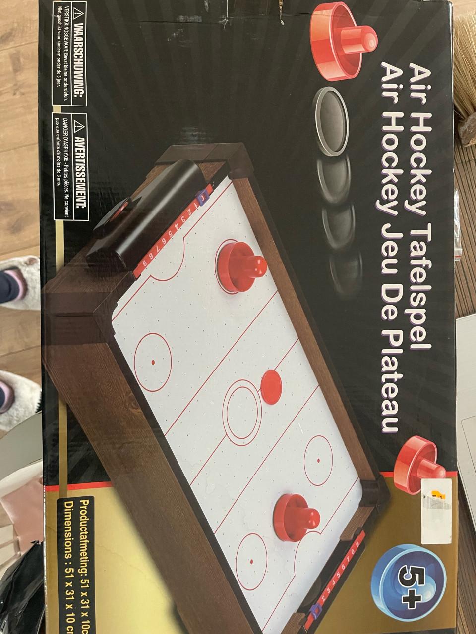 Air hockey spel