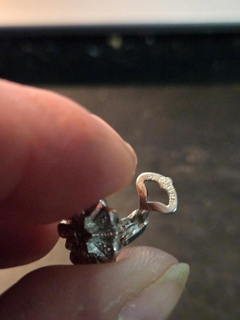 Vintage verzilverde manchetknopen Ø 1.5 cm met een decoratief bloemmotief