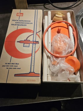 Mooie vintage prym rokzoommeter/rokspuit oranje, in originele doos