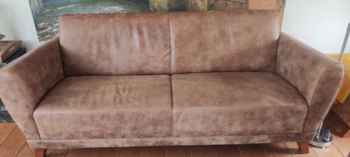 Bank met relax fauteuils en hocker