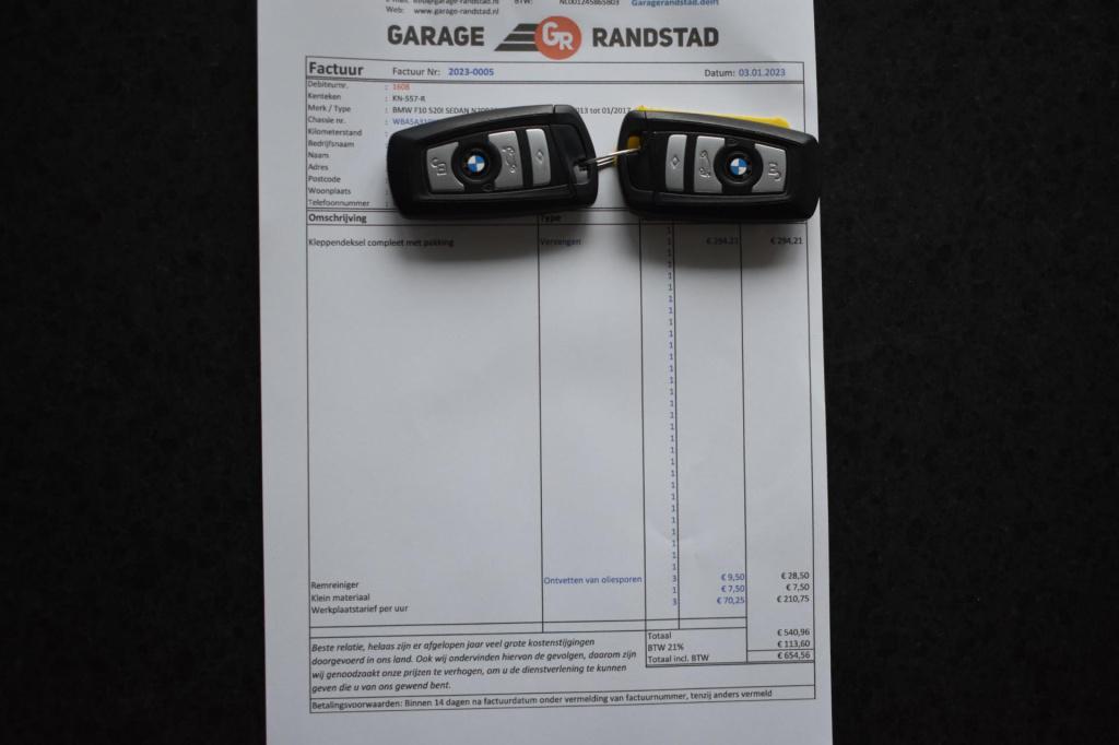 BMW 5 Serie 520i m sport | schuifdak | camera | leder | nap | adapt. cruise