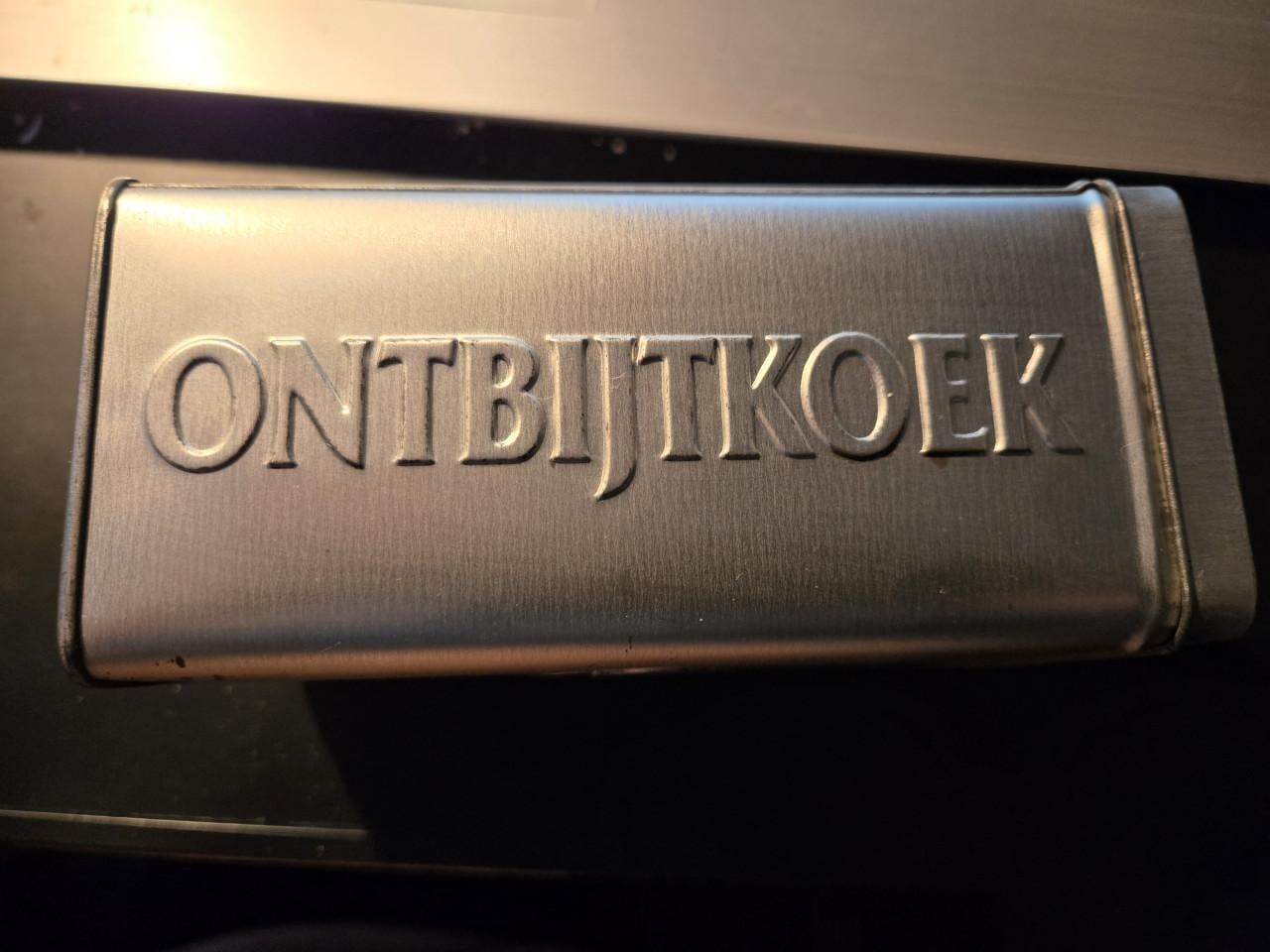 Vintage metalen bewaarblik van het Nederlandse merk Peijnenburg.