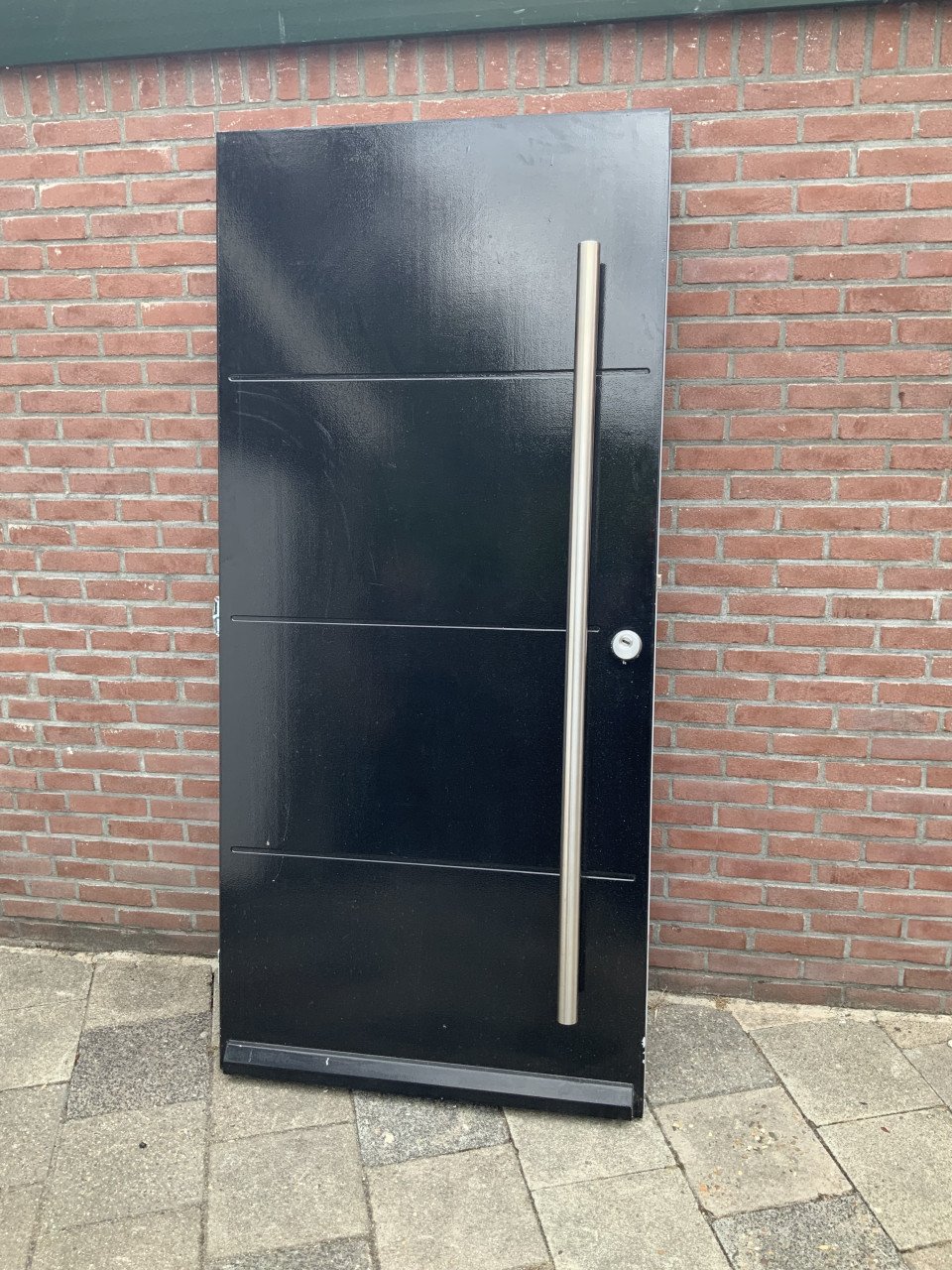 Dichten voordeur met rvs deurgreep
