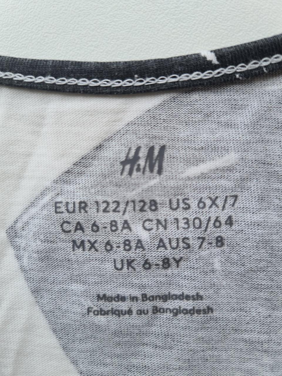 Ecru witte jurkje met zwarte hartjes van H&M  Maat 122-128