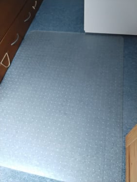 Kunststof plaat om vloerbedekking te beschermen