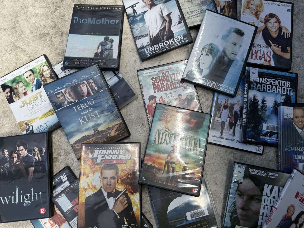 Assortiment DVD’s.  21 stuks voor 7,50.