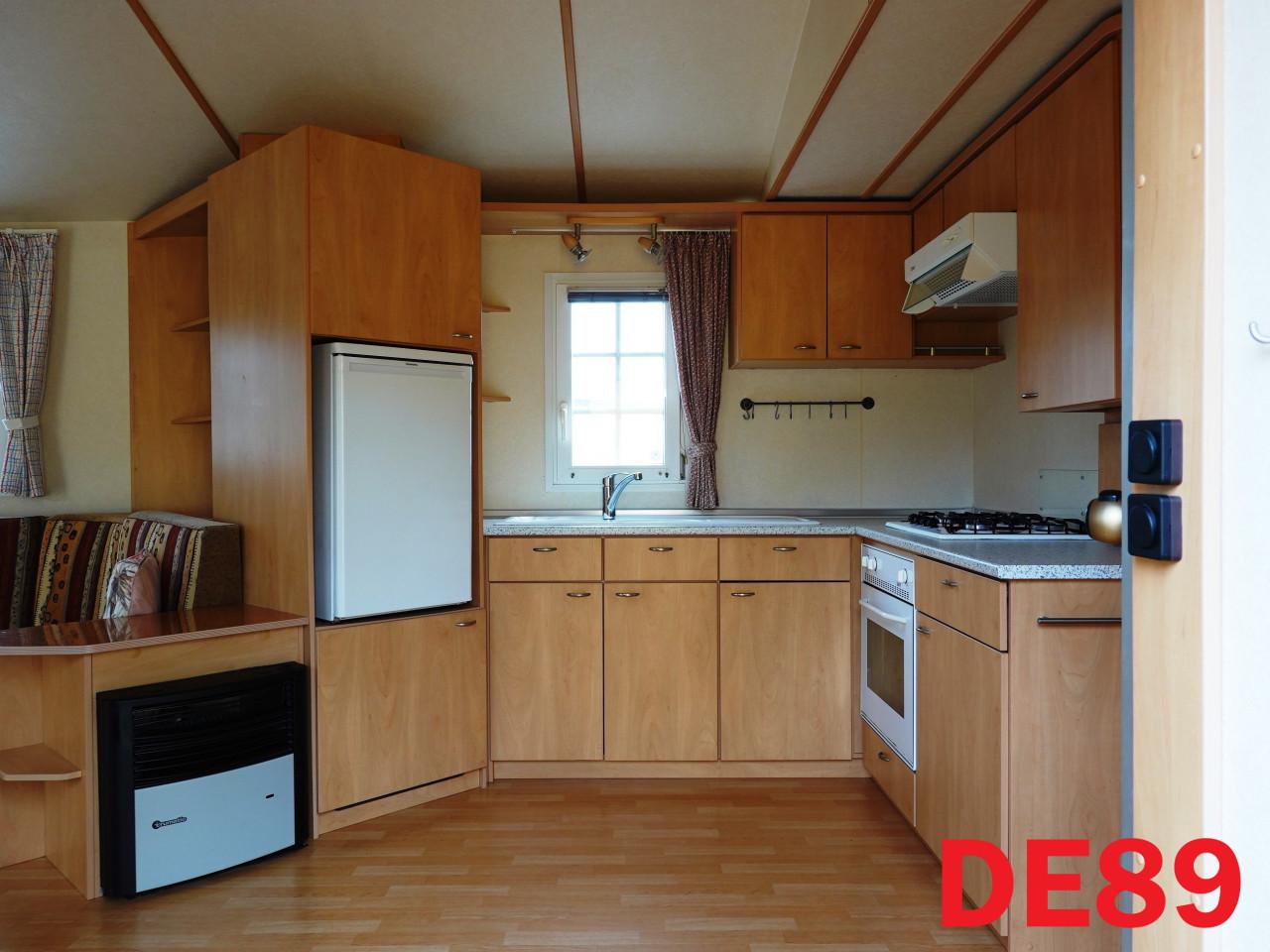 Keurig Bürstner chalet met 2 slaapkamers dubbel glas en middenkamer te koop