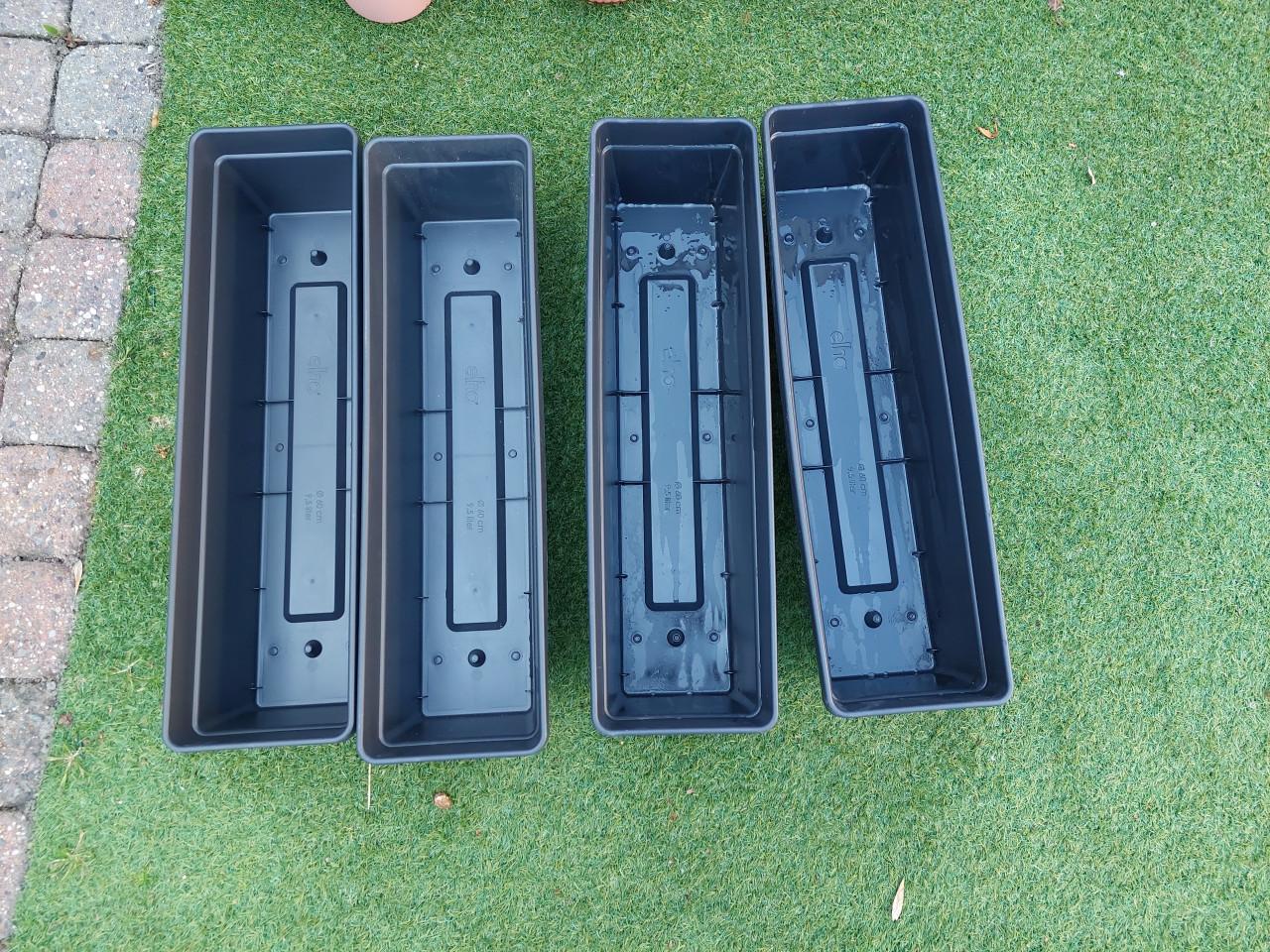 Pakket kunststof bloempotten in zeer goede staat