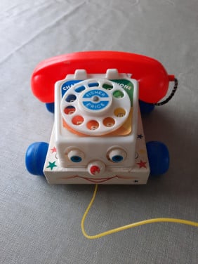 Fisher price telefoon + pluchen baby bal.