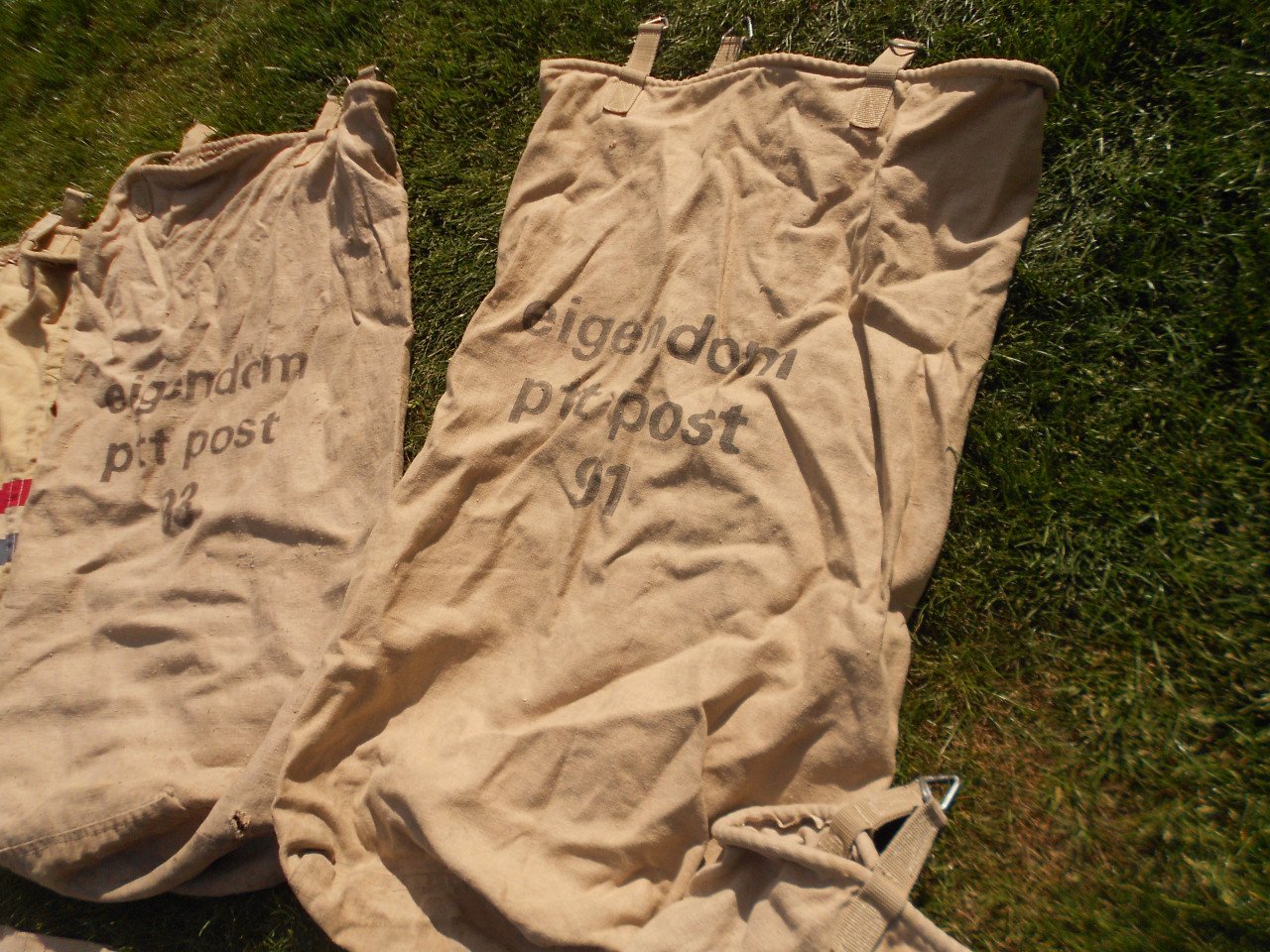Vijf vintage ptt postzakken