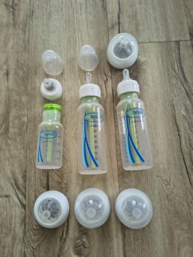 Complete set Dr Brown flessen en spelen, dopjes. Reflux fles