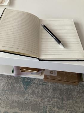 Notitieboekjes met pen