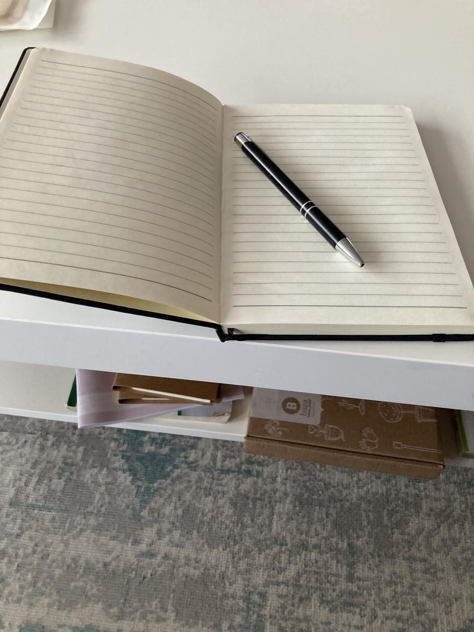 Notitieboekjes met pen