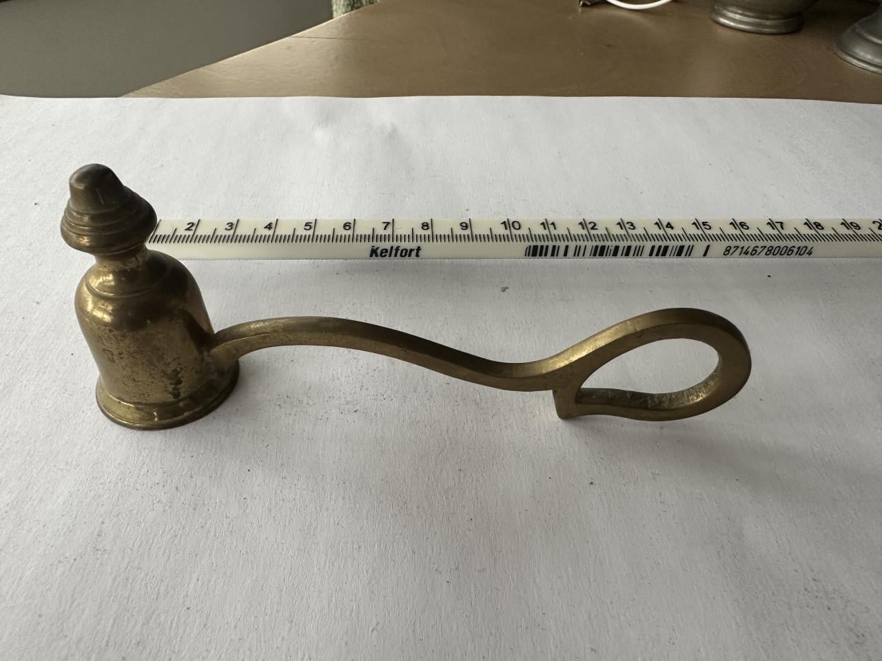 Koperen kaarsendover en brievenopener