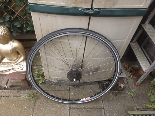 28 inch exage achterwiel, 7 speed cassette, uitvalnaaf