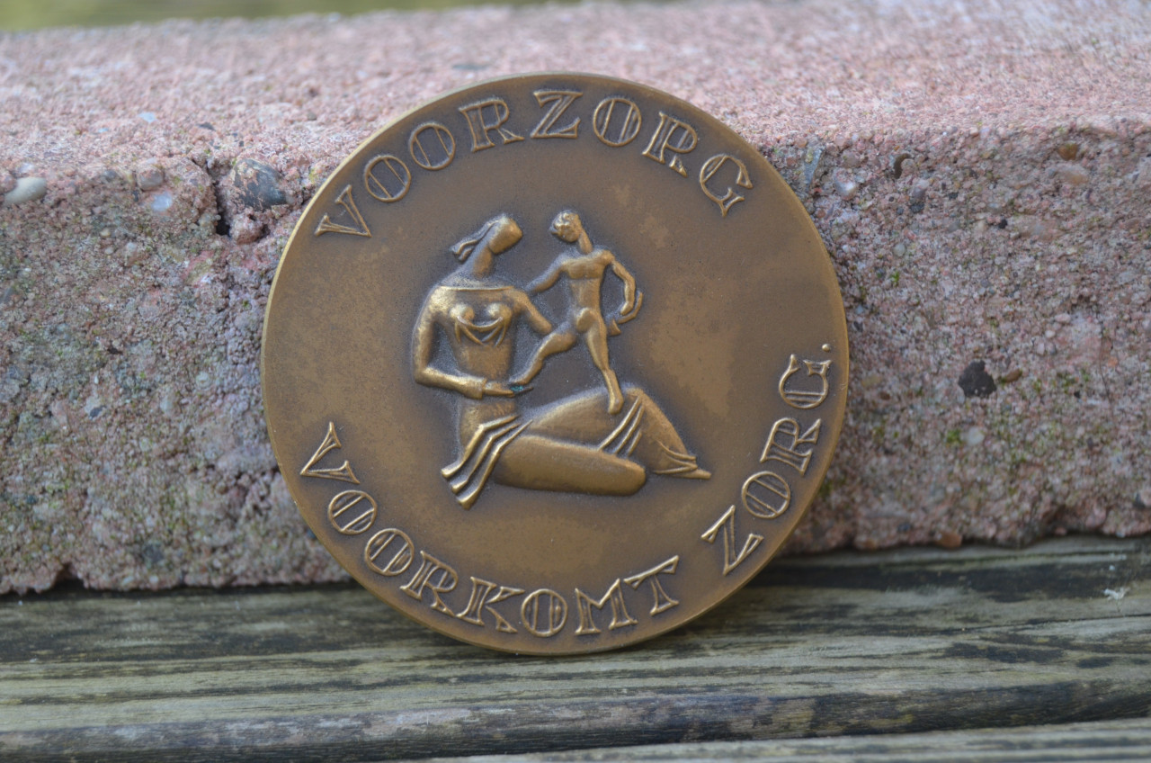 Bronzen penning verzekeringsmaatschappij
