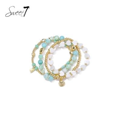 Armband groen met witte harten kralen met goudkleurige details