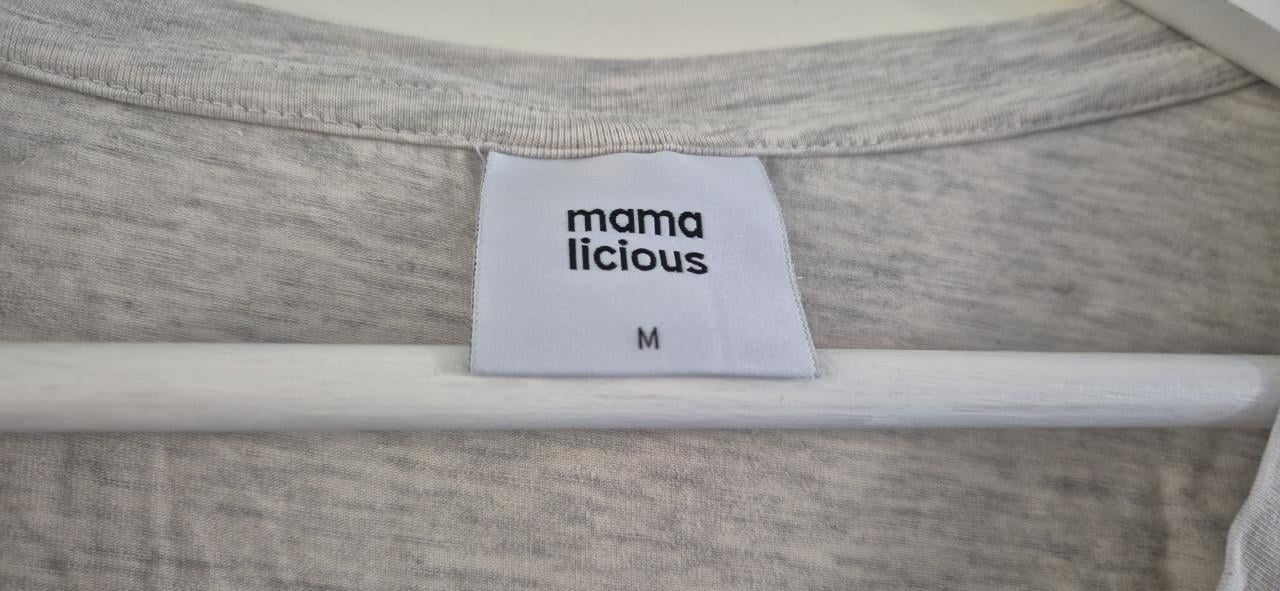 Zwangerschaps en voedingsshirts maat M