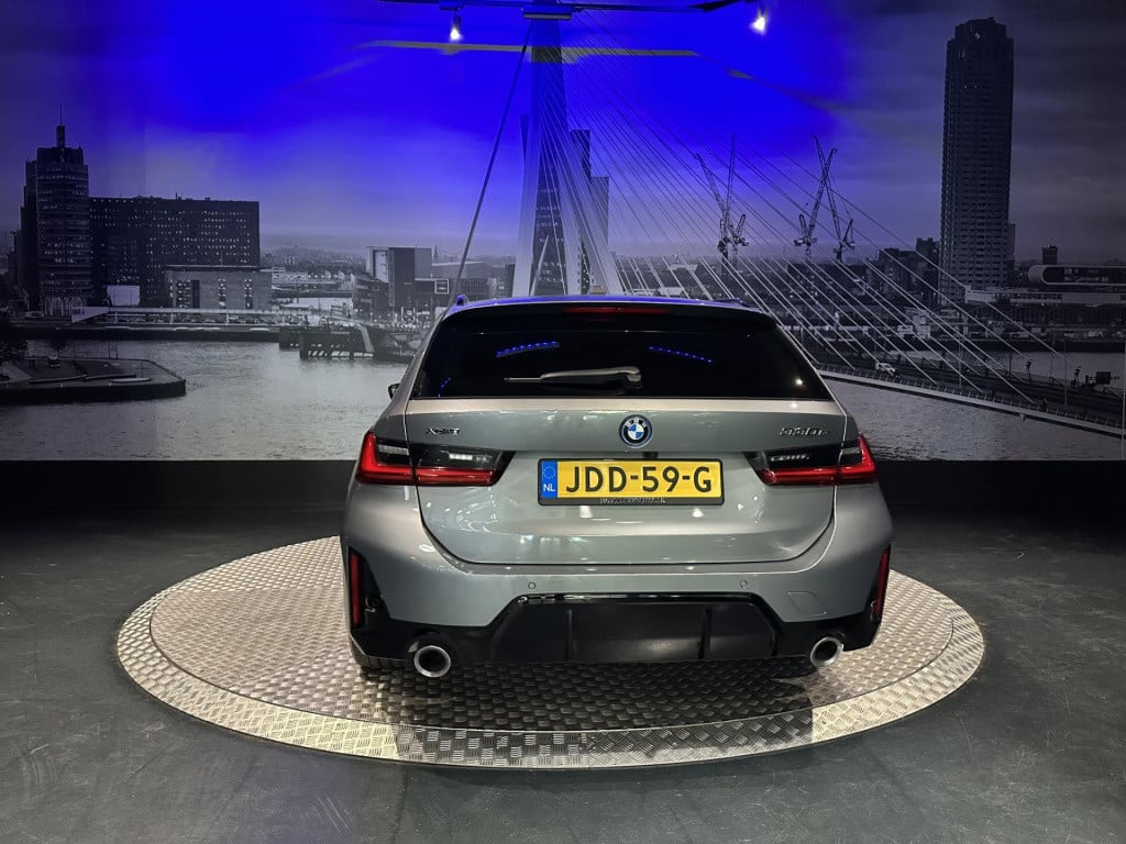 BMW 3-serie touring 330e xdrive *pano*360camera*sportstoelen*laser*