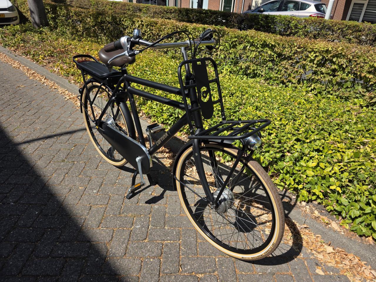 Zo goed als nieuwe Cortina elektrische heren fiets