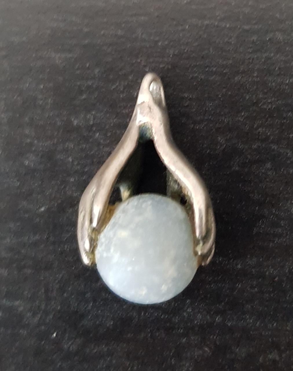 Angeliet hanger tussen healing hands