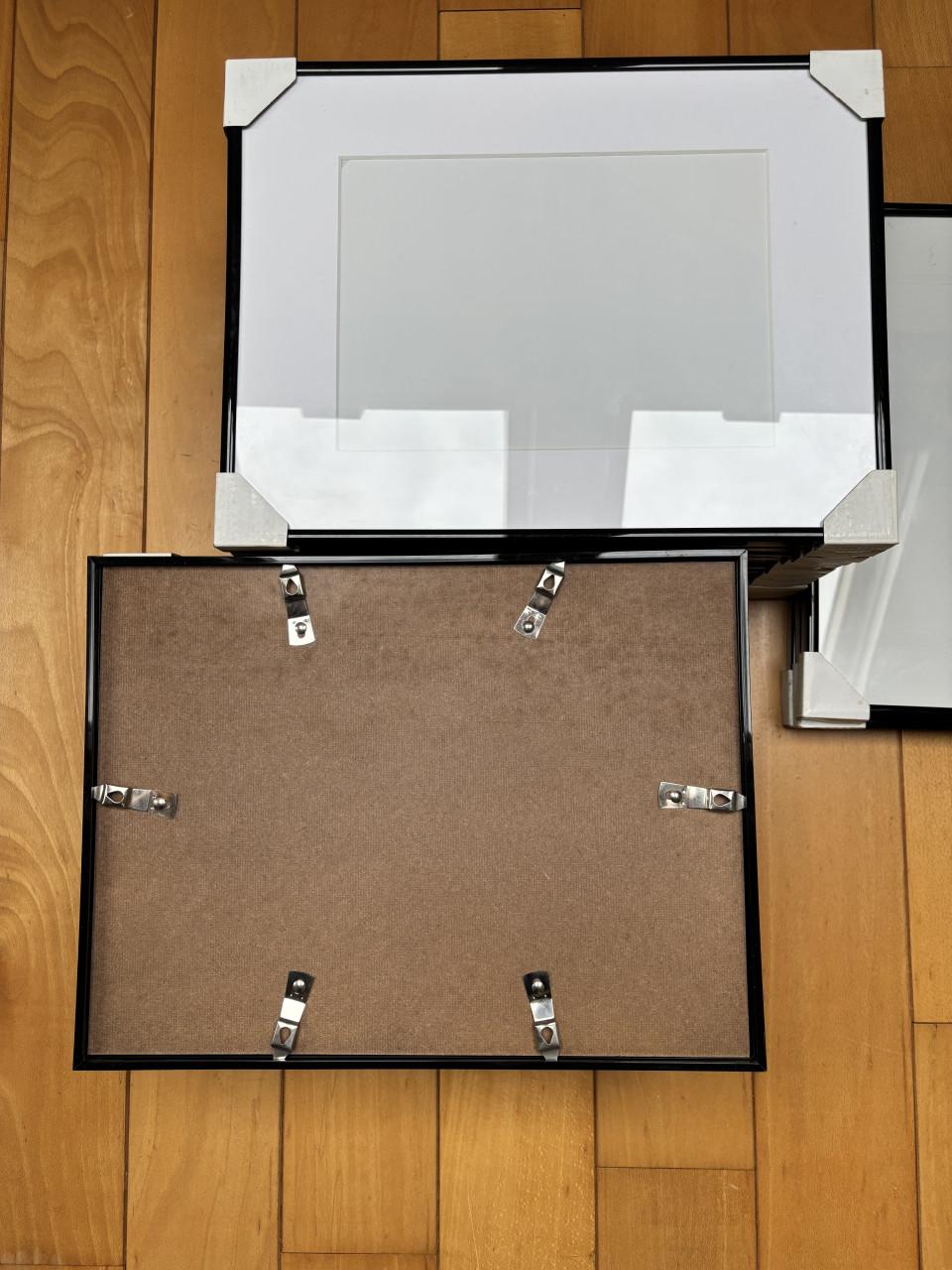 Fotolijsten ( zwart ) met passe-partout ( wit )