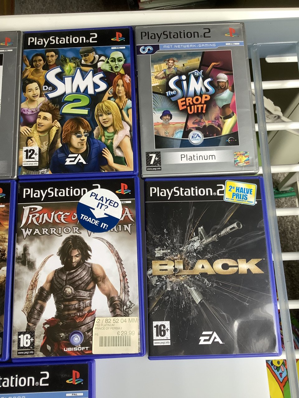 Stapeltje PS2 spellen die ik dubbel heb. Zie je iets wat je wilt overnemen,