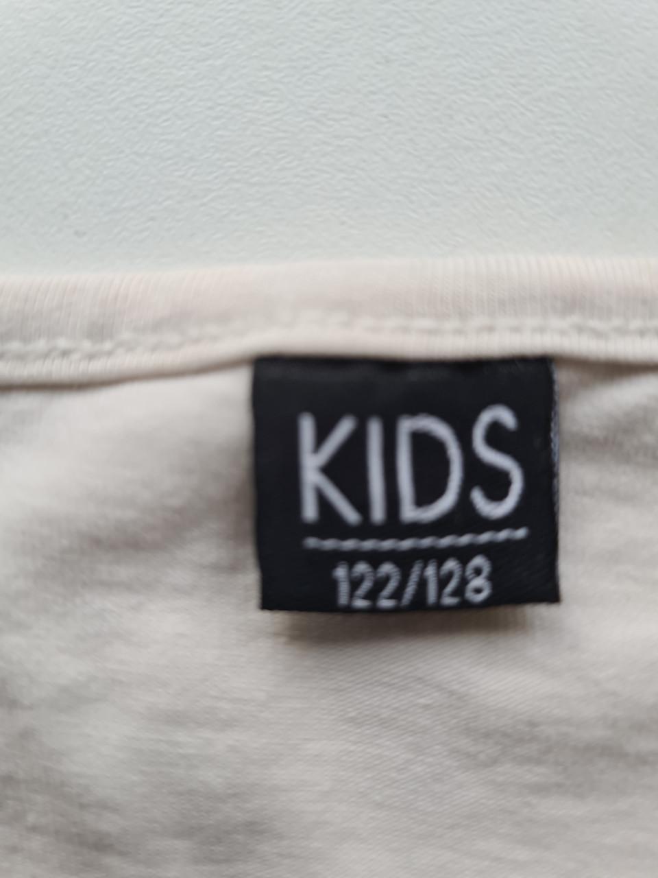 Crème,beige shirt met applicatie van Kids Maat 122-128