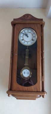 Houten wandklok
