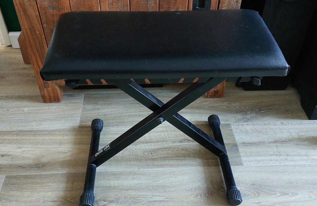 Verstelbare lederen piano kruk