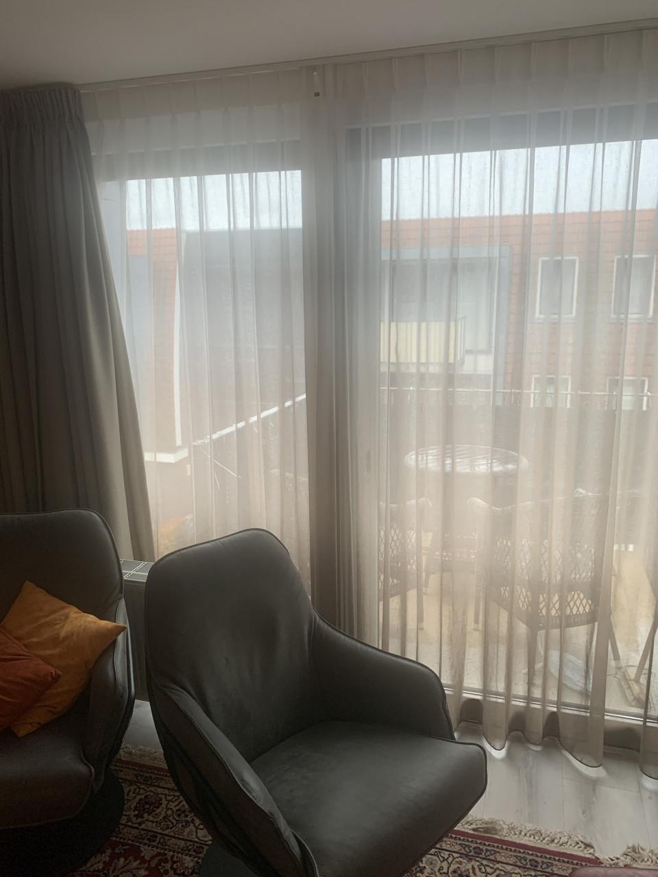 Vitrage van boven licht doorlopend naar donkerder