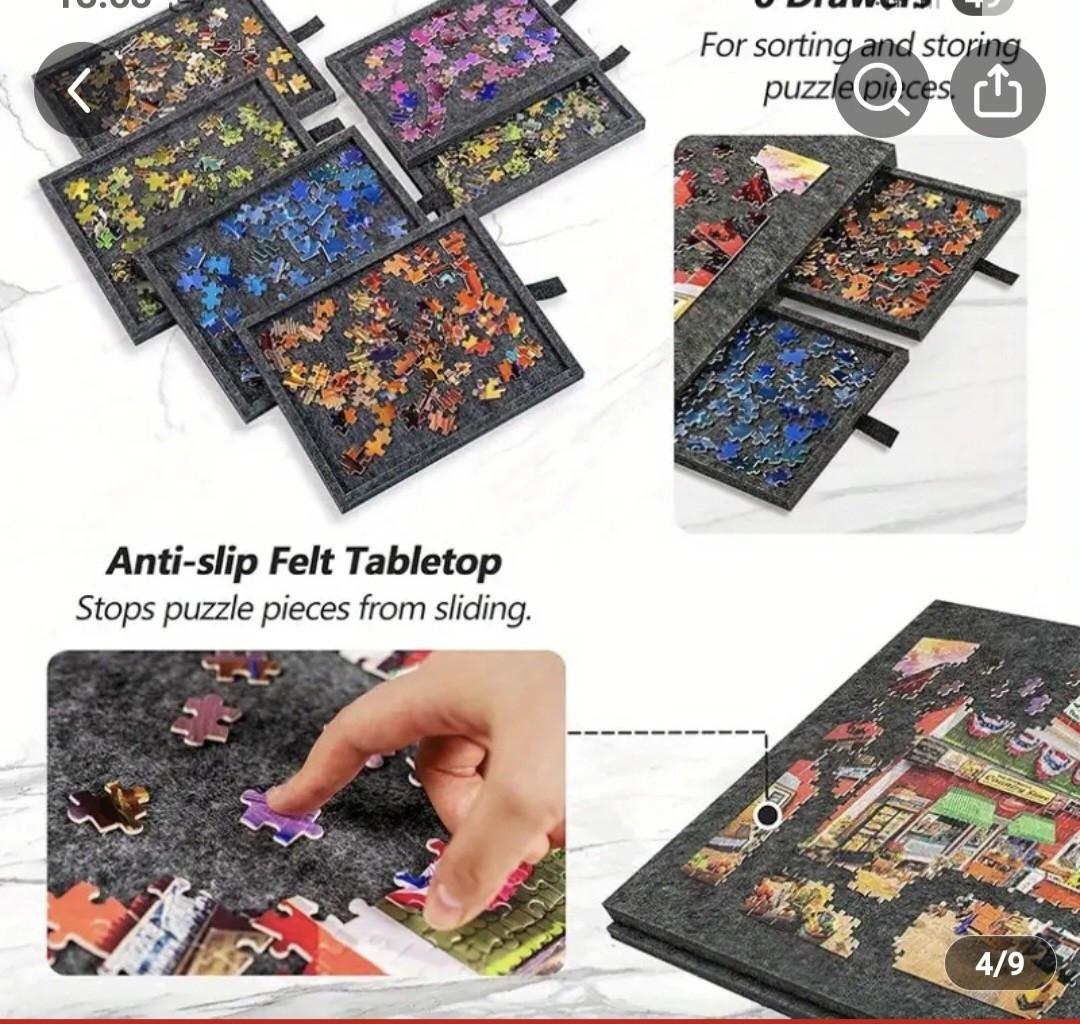 Een draagbare vilten tafelblad voor 1000-delige puzzels met lades