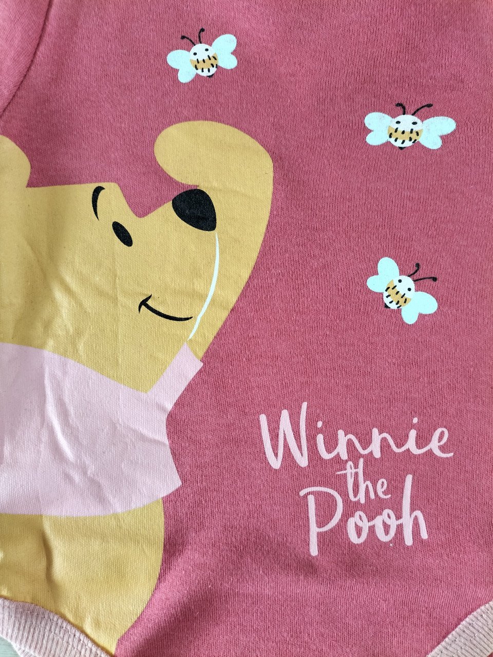 Disney romper Winnie the Pooh donkerroze maat 62/68