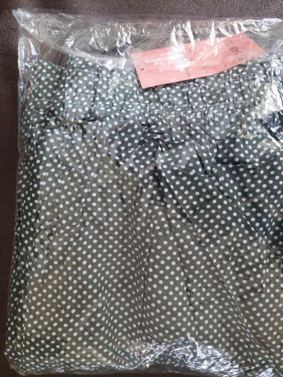Nieuwe groen/wit gestippelde dames flaredbroek mt M/l