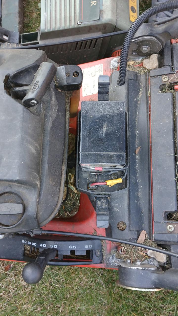 Grasmaaier en verticuteermachine