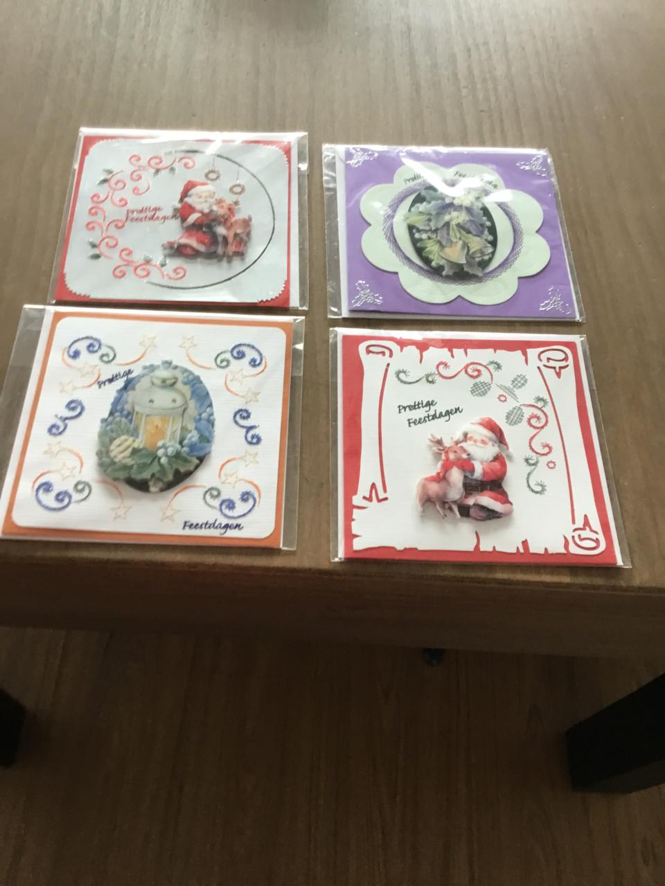 Geborduurde kerstkaarten