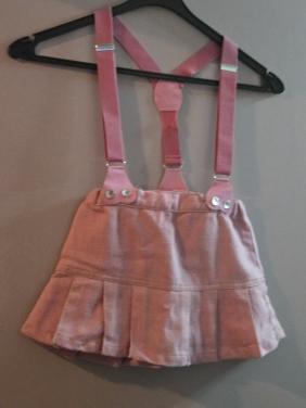 Roze geplooide rok met bretels. name It Maat 86