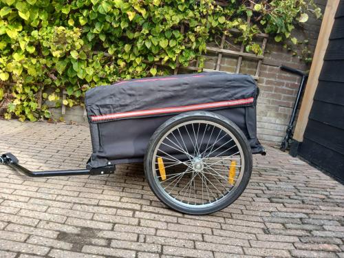 Fietskar met afdekhoes