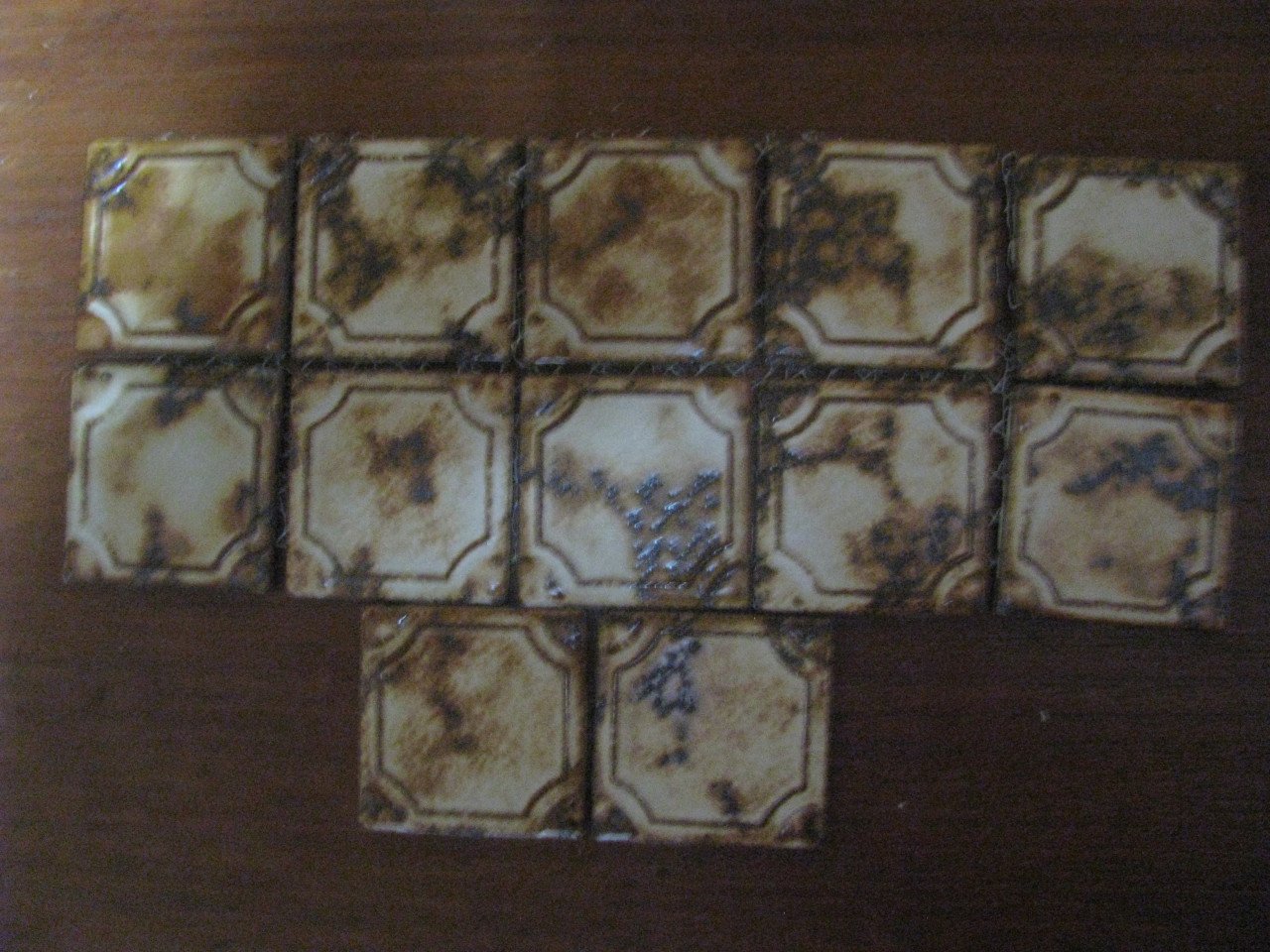 12 Kleine tegeltjes.