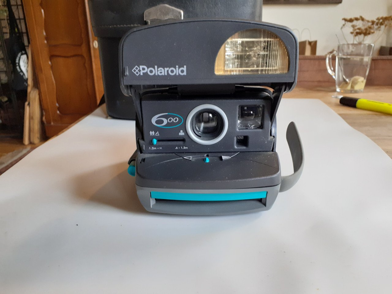 DIverse fotoapparatuur lenzenstatief belichtingsmeter oude camera alles in