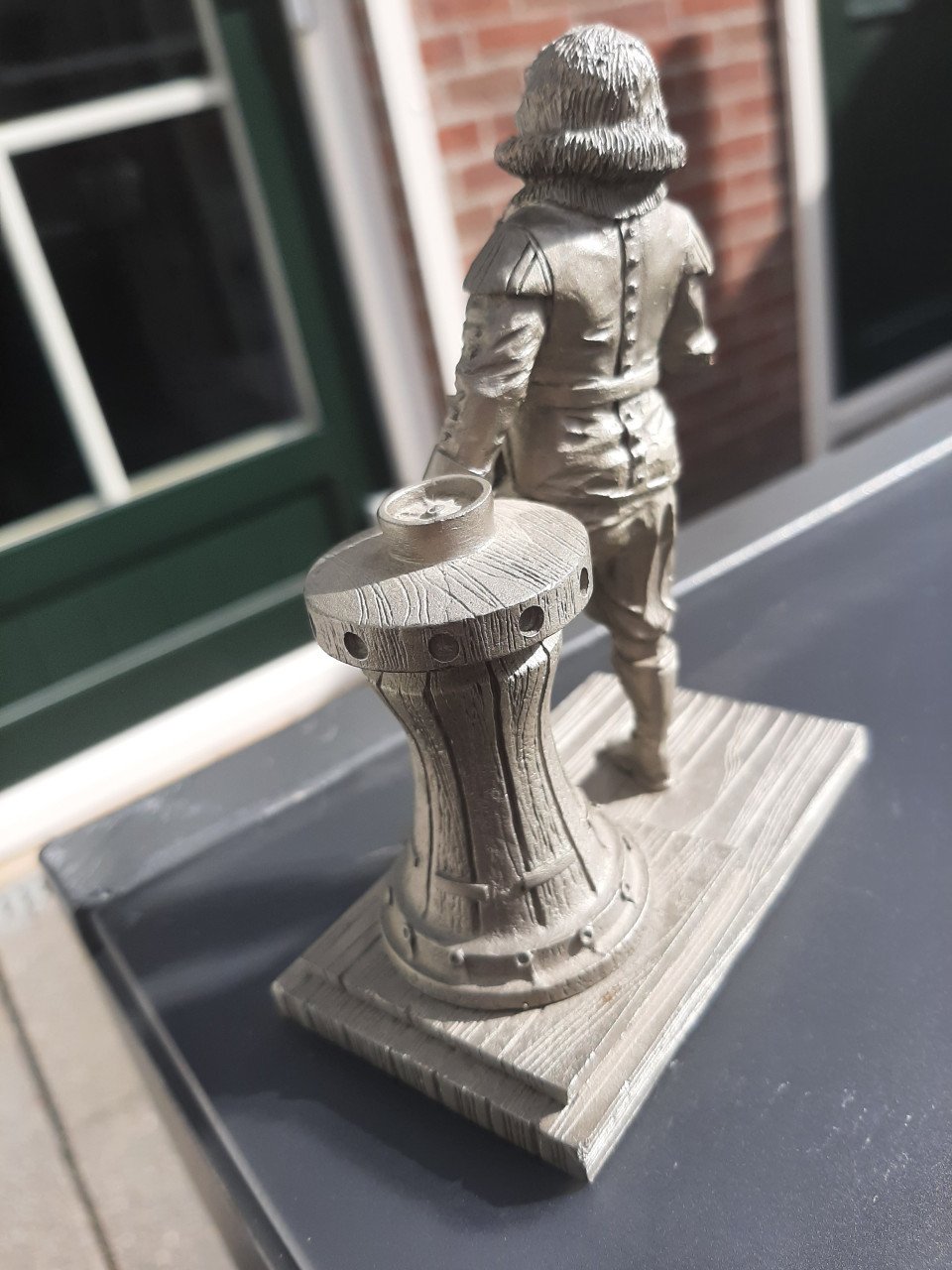 Fijn tin figuurtje de kapitein